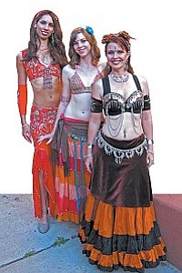 The passionate and original lyrics of Here II Here will be accentuated by the graceful moves of Holly Luky and the D.O.L.L.S (Daughters of LiLLith bellydance fusion group).