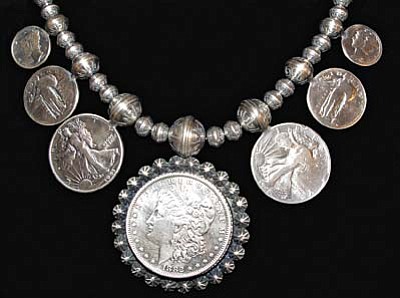 “Vintage Coin Necklace” by Paul Livingston, is 20” in length w/matching 1.5” earrings (not shown), of sterling silver and authentic coins. Livingston and his son Darren are two of the new jewelers being featured for the New Year on “1st Friday” in Sedona.<br /><br /><!-- 1upcrlf2 -->