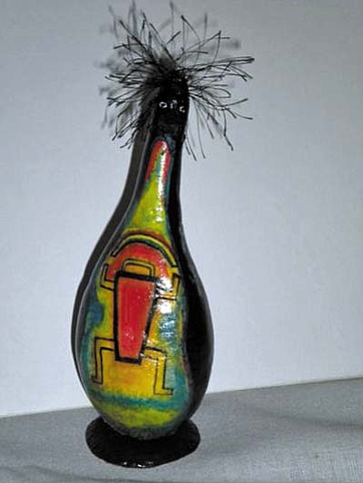 Dawn Moffett will show you how to work with the ink dyes and other types of decoration for your gourd art.