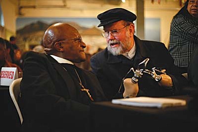 Father Michael Lapsley (right) with Archbishop Desmond Tutu in South Africa.