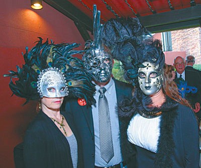 Shondra Jepperson and Eric and Bernadette Meyers enjoy last year’s VVCC Masquerade Fundraiser at the Hilton Sedona Resort. Jepperson will be the Master of Ceremonies again this year.