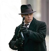 Johnny Depp as John Dillinger