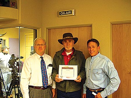 Yavapai County’s December “Unsung Hero” winner Tom Henry (center) with Yavapai County Superior Court Presiding Judge Robert Brutinel and County Supervisor Chip Davis.