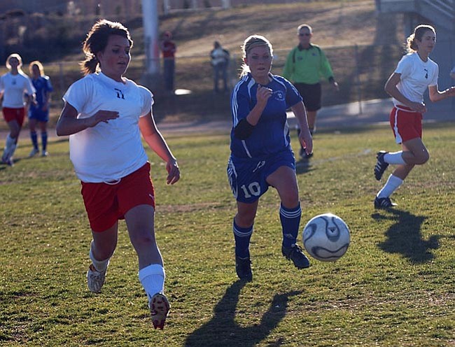 VVN/Wendy Phillippe
No. 11 Freshman Makenzie Mabery chases after the ball along side a player from Sinagua during the GCR Tournament.