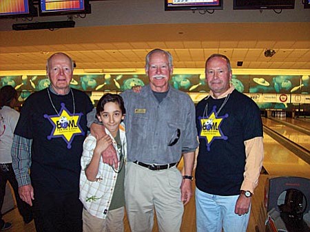 From left, Big – Bill Reller, Little – Spencer, His Big and Board Member – Jerry Showalter, and Big – Roy Gustavson.