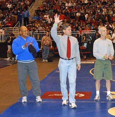 FILE PHOTO<br/>COACH WOKASCH BEING RECOGNIZED AS ONE OF THE TOP COACHES IN ARIZONA DURING LAST SEASON'S INDIVIDUAL STATE WRESTLING MEET.