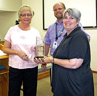 Councilwoman Linda Norman (from left), Jim Wagner and CAT Manager Shirley Scott showing council award Tuesday. VVN/Jon Hutchinson