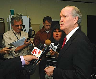 John Munger called the 1998 voter-approved measure which let candidates for statewide and legislative office get public funds "a well intended law that has created all kinds of perverse results' in the election process. Photo by Howard Fischer, Capitol Media Services