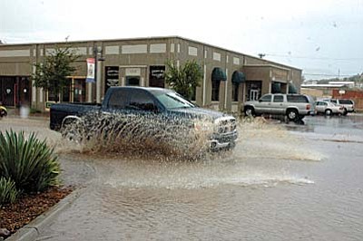 VVN/Steve Ayers<br /><br /><!-- 1upcrlf2 -->A storm on Thursday afternoon dumped over two inches of rain on parts of Camp Verde, turning Main Street into a flowing stream, running from gutter to gutter.