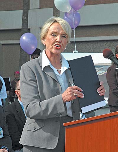 Gov. Jan Brewer declares Monday to be Arizona Child Health Day. Brewer said she saw nothing inconsistent with the declaration and cuts, both past and future, in programs for child health. (Capitol Media Services photo by Howard Fischer)
