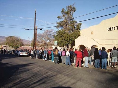Clients line up to receive a free turkey at Old Town Mission in 2009.