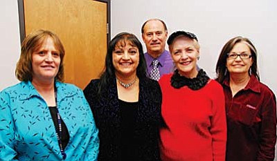Jessie Walters (second from left) with Dave Beach, former boss Barbara Wright and Murie Murillo, also in Employment.