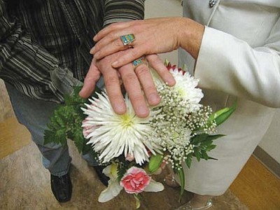 Courtesy photos<br>
The flowers, the cupcake wedding cake, and even the rings came out of VVMC's gift shop for the last-minute wedding that cost about $100.