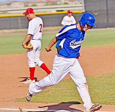 <b>Jesse Fullbright</b> trots around third base after sending one over the fence against St. Johns in the second round of the 2A state tournament at Peoria Sports Complex Friday. VVN/Sean Morris