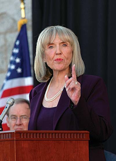 Gov. Jan Brewer blasted a draft redistricting map that virtually guarantees at least four of the state's nine congressional districts to Republicans like her and makes three others competitive. "It's like thievery,' Brewer said.<br /><br /><!-- 1upcrlf2 -->