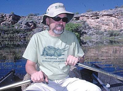 Given that he has found evidence of turtles moving freely through the swallot that connects Montezuma Well with Beaver Creek, biologist Jeffrey Lovich says that even if he succeeds in capturing the last turtle aliens, more could make their way back into the well. VVN/Steve Ayers