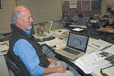 VVN/Philip Wright<br>
Jeff Scroggins, seventh- and eighth-grade science teacher at Clarkdale-Jerome School, is able to use a special website in his classroom that shows in real time the kilowatt hours of electricity produced, the CO2 emissions saved and the dollars saved through the use of the new solar panels installed at the school.