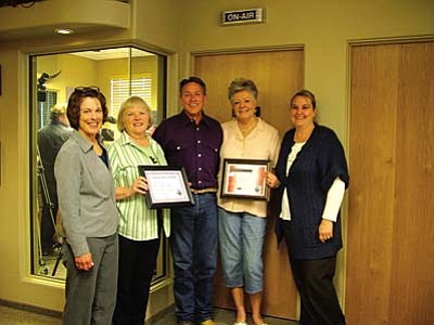 Deanna King and Judy Miller received awards from County Supervisor Chip Davis