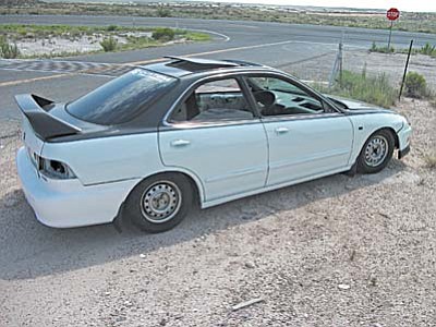 This 1998 Acura four-door sedan was found abandoned and stripped of its engine and interior just off the road near State Route 89A and Rocking Chair Road.
