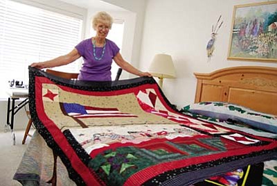 VVN/Steve Ayers<br /><br /><!-- 1upcrlf2 -->After having won every award she says she will ever need, Eunice Hill says her goal now is to give back by making quilts and giving them to charities to help raise money.