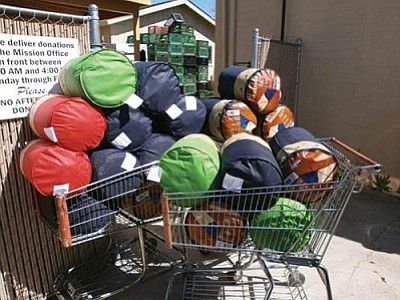 Sleeping bags ready to go at Old Town Mission. The OTM needs coats, blankets, sleeping bags and tents this winter.
