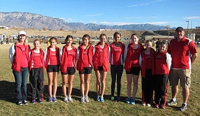 <b>The Aftershock Distance Club</b> poses for a picture in Albuquerque at the USA Track & Field Cross Country National Championships. Courtesy Photo