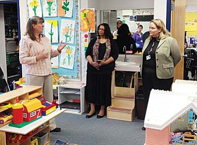 Principal Nancy Erickson shows one of the Bright Bears Preschool classrooms to First Things First Yavapai Regional Partnership Council Members and First Things First CEO Rhian Evans Allvin.