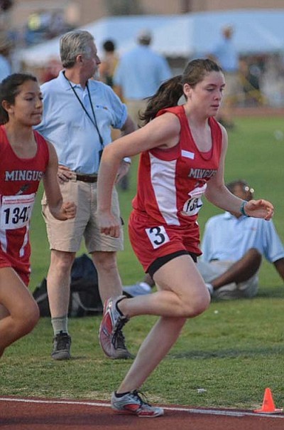 Penny Fenn (front) and Karen Arellano (back) pace each other during a distance race at the Division-III track and field state championships. More recently, Penny and Karen participated in the L.A. Jets Invitational and led the 15-16-year-old team to a second place finish. VVN/Travis Guy