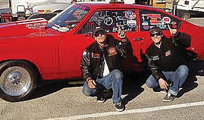 Joe Bennett, left, and his son Cody Bennett, celebrate a 2011 Mean Street Championship in the Pacific Street Car Association. Photo courtesy of Monte Brown.