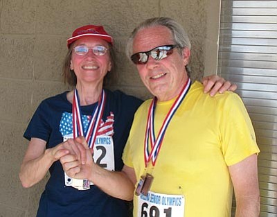 Anne Crosman, Village of Oak Creek, and Mike Capozzoli, Sedona,  were medal winners in the Arizona Senior Olympics Track and Field events.