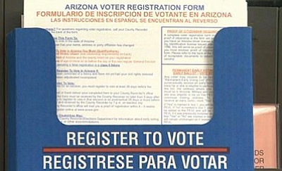 Arizona's voter registration form requires proof of citizenship. Arizona and Kansas, which has a similar law, are in court to try to force the federal government to include the requirement on federal registration forms for people registering in those states. (Cronkite News Service photo by Cronkite NewsWatch)
