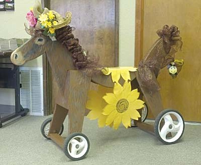 More than 40 sawhorses created and decorated by Cottonwood merchants will face off to establish the “reining” winner of the first Bootleg Derby.