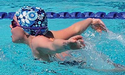 Renae Porteous, age 9, swam qualifying times in six events to qualify for the  Regional Meet in July.