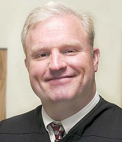 Judge Brutinel said Arizona law is very specific when it comes to the question of reuniting a child with a parent. He said it requires a court, at a hearing to "consider the health and safety of the child at its paramount concern.' And Brutinel said a court must also determine that "the return of the child would not create a substantial risk of harm.'<br /><br /><!-- 1upcrlf2 -->