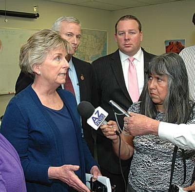 Flanked by other legislators, Rep. Kate Brophy McGee talks with reporters this spring about needed reforms to the child welfare system last year. (Capitol Media Services file photo by Howard Fischer)