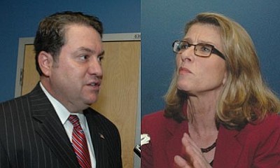 Republican Mark Brnovich and Democrat Felecia Rotellini following Tuesday's debate.  (Capitol Media Services photos by Howard Fischer)