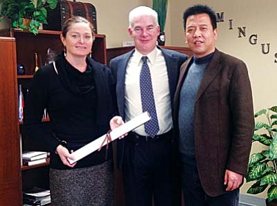 Mingus Superintendent Paul Tighe (center) with MUHS Principal Jennifer Chilton and Principal Ge Shimin of Handan Gangyuan High School in the Hebei province of China. VVN/Yvonne Gonzalez