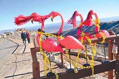 The famous Jerome flamingos are back in Jerome, but under lock in key now after the flamingos, which were dressed as Santa and his elves, were recently stolen and never recovered.
