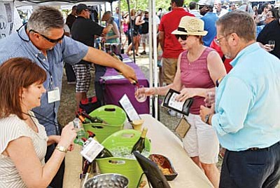 Tilted Earth Wine & Music Festival returns June 19-20<br /><br /><!-- 1upcrlf2 -->Page Springs Cellars and celebrated Arizona Winemaker Eric Glomski are pleased to announce the release of tickets for the second annual Tilted Earth Wine & Music Festival on June 19 and 20 at Riverfront Park in Cottonwood. Tickets are on sale through the Page Springs website.<br /><br /><!-- 1upcrlf2 -->The vibrant festival returns this year with an expanded two-day line up of well-known folk and acoustic rock entertainment like Rusted Root, Robert Earl Keen and The Lone Bellow. Wine lovers can enjoy vino from 17 Northern Arizona wineries, along with cuisine from eight gourmet food trucks from the Phoenix Street Food Coalition, including The Rocket Woodfired Pizza, The Affogato Truck, Sandra Dee’s Creole Kitchen and Burgers Amore. Additional vendors like Backstage Gastropub, Chocolita exotic raw chocolate and Local Juicery will sell a variety of other fare.<br /><br /><!-- 1upcrlf2 -->The event will also include an expanded selection of kids and family activities including a rock climbing wall, bounce house, teen gaming tent and a simulated archaeological dig hosted by Verde Valley Archaeology all at no charge. Kids crafting supplies will be provided by Verde River Valley Nature Organization for a small charge.  <br /><br /><!-- 1upcrlf2 -->Attendees will also enjoy a change in event hours from 4 p.m. to midnight with music running between 5-11 p.m., which will allow event goers to enjoy the festival among the trees in the cooler evening hours.<br /><br /><!-- 1upcrlf2 -->Adult admission can be purchased online at TiltedEarthFestival.com for $45. Youth tickets (13-20) are $20 and children 12 and under are free. Adult admission includes a reusable Govino wine glass and five free tastings. Additional tastings will be available for purchase, as will bottles from all wineries. Those who wish to take home their purchases may also store their wines in a state-of-the-art refrigeration truck, courtesy of the Tilted Earth Festival.
