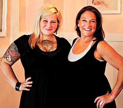 Niki Kubrock (left), formerly of Deviant Light Photography, captures the Benjemax Studio from owner Tere Ireys (right). (Photo courtesy of Benjemax Studio)