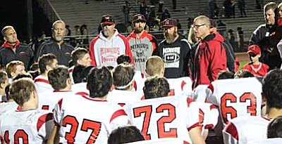 Mingus Head Coach Bob Young gives his final post-game speech of the season after suffering their second-loss of the season to the Verrado Vipers, 20-14, Friday night. “2016 starts on Monday” Young said as he brought his speech to a close. (Photo by Greg Macafee)