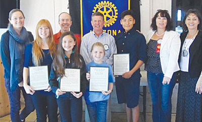 Pictured from left are Jennifer Chilton (Rotarian), Vivian Koeppe (MUHS), Brian Sawyer (Rotarian), Raina Esparza (CJES), Casey Rooney (Rotary President), Kassidi Ough (OCS), Vance Tewawina (CVHS), Carrie King (Rotarian) and Lana Tolleson (Rotarian). For more information about your local Rotary Club ,please visit www.rotarycluboftheverdevalley.org or call Club President Mark Tufte at 639-0020.