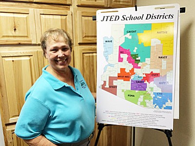 Lois Lamar, chief executive officer, VACTE, displays map of career and technology districts called JTEDs, which overlay existing school districts. (VVN/Tom Tracey)