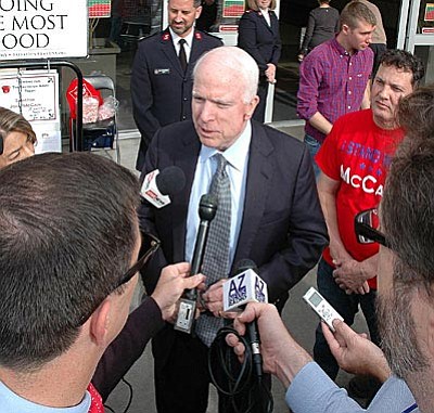 John McCain answers questions Monday about friend Lindsey Graham dropping out of the presidential race and his own fate as he seeks another six years in the U.S. Senate.  (Capitol Media Services photo by Howard Fischer)