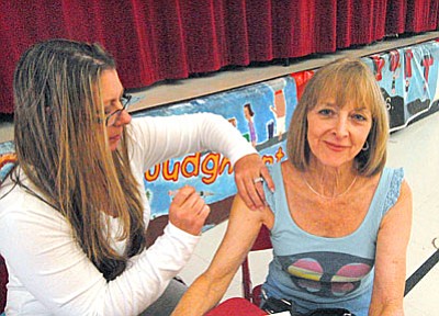 Flu season can last well into February or even March and your flu shot may be saving another’s life.  (VVN Vyto Starinskas)