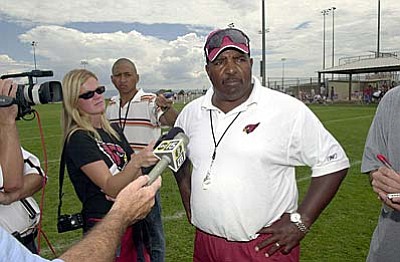 In this Aug. 6, 2005, file photo, former Arizona Cardinals head coach Dennis Green talks to the media after a no-pads scrimmage during training camp at Pioneer Park in Prescott. Green died of a heart attack Friday. He was 67.(File Photo courtesy of The Daily Courier)
