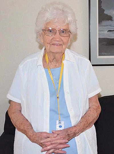 VVCC client Wanda, 87, wearing her new Guardian Angel medical alert pendant.
