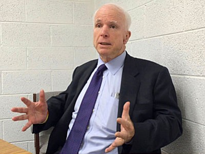 John McCain: The world is more dangerous than it’s ever been since the end of WWII. Millions of refuges. ISIS all over the world. China aggressively active in the Pacific. Russia dismantling Ukraine. (VVN/Vyto Starinskas)