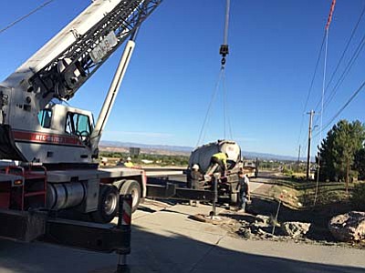 A loaded cement truck traveling southbound on SR 89A Monday morning experienced a mechanical malfunction, causing part of the frame to break and emptying one of three containers of cement powder. (VVN/Tom Tracey)
