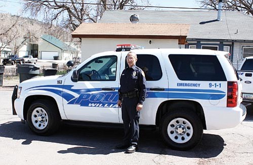 <br>Ryan Williams/WGCN<br>
Officer Bill Tuey stands in front of the radar equiped traffic enforcement vehicle the Williams Police Department recently acquired through a grant from the Governor's Office of Highway Safety.